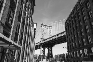 Manhatten Bridge through the buildings in Brooklyn