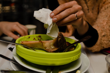 Closeup on dirty plates after eating dishes on the table abstract food industry background. Clean and wash time. Closeup photography image