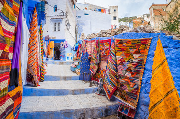 Fototapeta na wymiar Street market in blue medina of city Chefchaouen, Morocco, Africa.