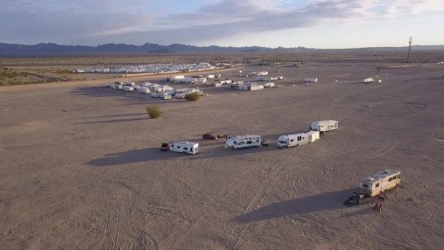 Aerial of Recreational vehicles parked at a large campsite in the desert