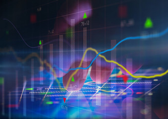 Businessman looks at the graph.