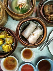 Traditional style Chinese cuisine, Various Chinese Steamed Dumpling In Bamboo Steamer container 