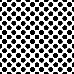 Seamless black polka dot pattern on white. Vector illustration. © dyeekc