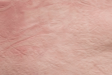 Fototapeta premium pastel painted creased tissuse paper background texture