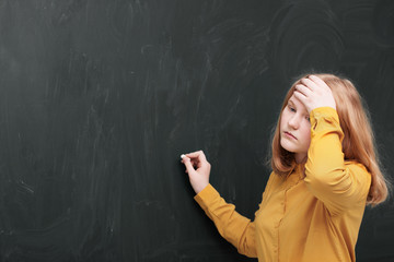 A girl at the blackboard