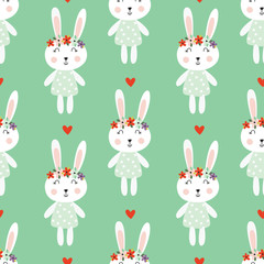 Seamless pattern with cute rabbits and flowers
