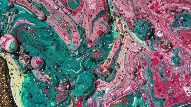 Top view Bright Collors Bubbles Slow Motion Oil Ink is fantastic structure of colorful chaotic motion bubbles stock video is a beautiful, unique, organic 4K clip.