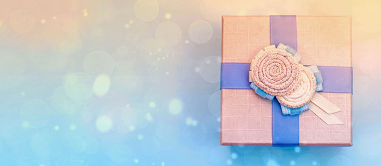 Banner One decorative gift box on a blue background.