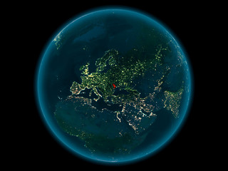 Moldova on planet Earth in space at night