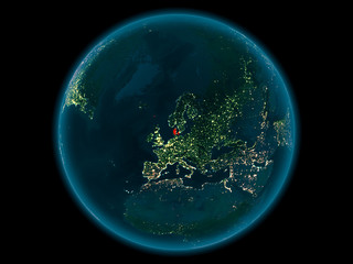 Denmark on planet Earth in space at night