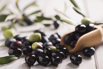 Black Olives on a white table