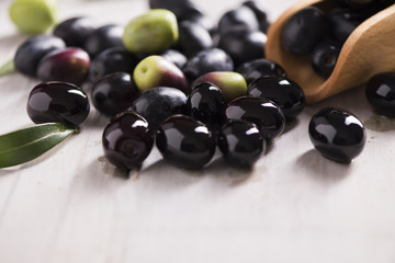 Black Olives on a white table