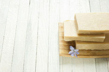 Soaps and blue flowers