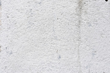 Wall fragment with scratches and cracks