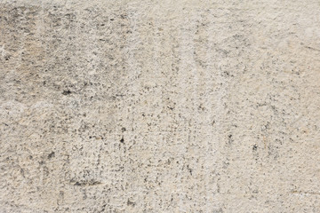 Wall fragment with scratches and cracks