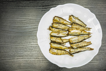 Smoked sprats in oil. View from above.