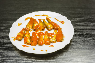 Sprats in tomato sauce.