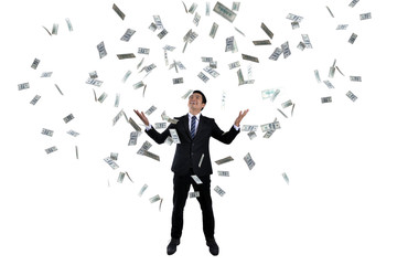 Young businessman With lots of money Based on success in business investment.