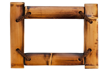 Beautiful wooden frame made of bamboo and threads on a white background for photographs