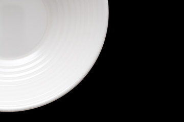 White plate for food on a black background