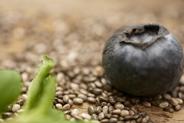 close up of blueberry on chia seeds