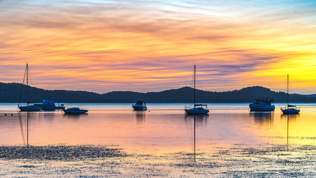 Dawn Waterscape over the Bay with Boats