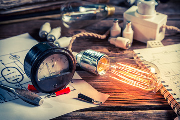 Physics classroom with Edison light bulb and electrical diagram