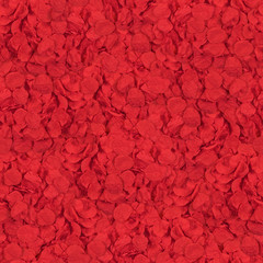 seamless texture from paper petals of flowers red color