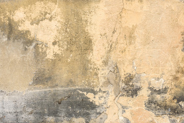 Wall fragment with scratches and cracks
