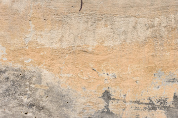 Wall fragment with scratches and cracks