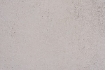 Wall fragment with scratches and cracks