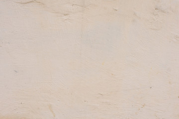 Wall fragment with scratches and cracks