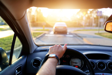 Driving in the sun on a car