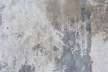 Wall fragment with scratches and cracks