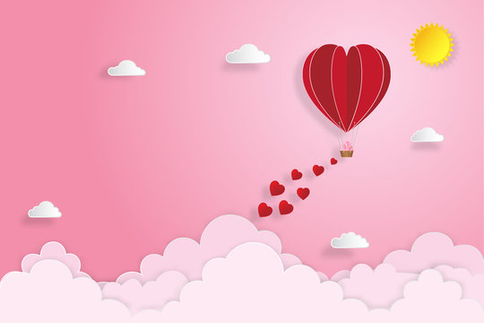 The hot air heart balloon on pink sky as love, happy valentine's day, wedding and paper art concept. vector illustration.
