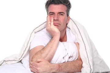 Obraz premium Man in the bedroom