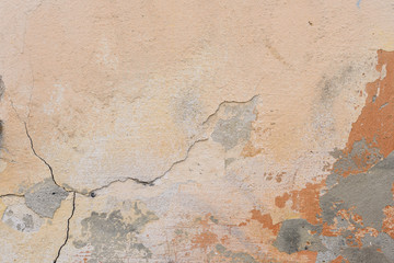 Wall fragment with scratches and cracks