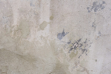 Wall fragment with scratches and cracks
