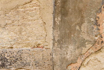 Wall fragment with scratches and cracks