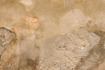 Wall fragment with scratches and cracks