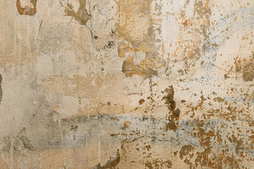 Wall fragment with scratches and cracks