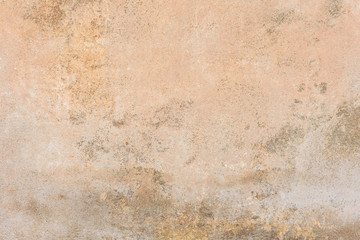 Wall fragment with scratches and cracks