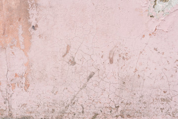Wall fragment with scratches and cracks