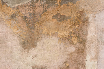 Wall fragment with scratches and cracks