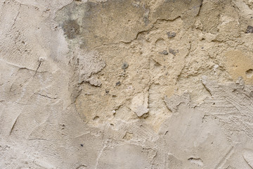 Wall fragment with scratches and cracks