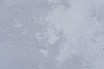 Wall fragment with scratches and cracks
