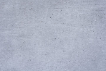 Wall fragment with scratches and cracks