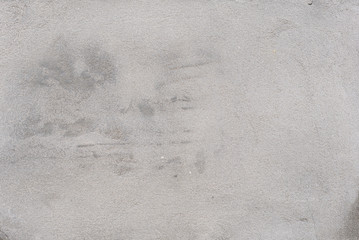 Wall fragment with scratches and cracks
