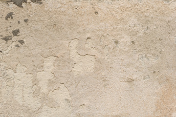 Wall fragment with scratches and cracks