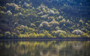 Landscape on the river Dniester. The broad channel of the river, a lot of space, water, sky and mountains